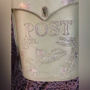 Decorative metal mailbox.